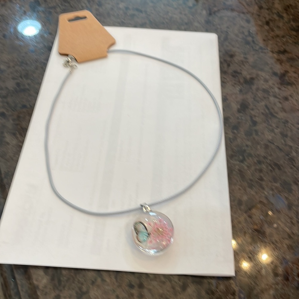 Butterfly pendant necklace with light blue necklace
